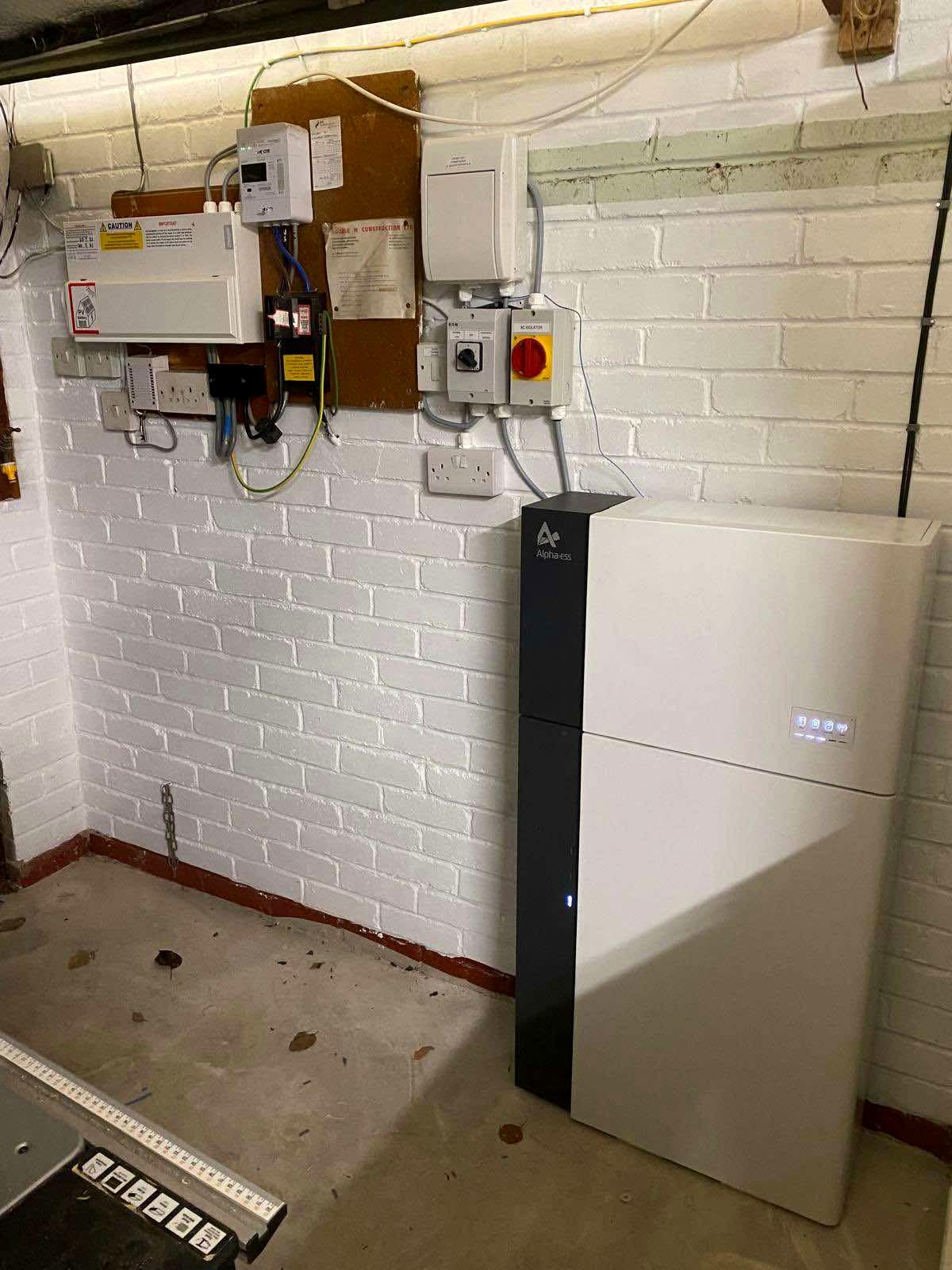 Alpha ESS battery and inverter installed alongside the consumer unit