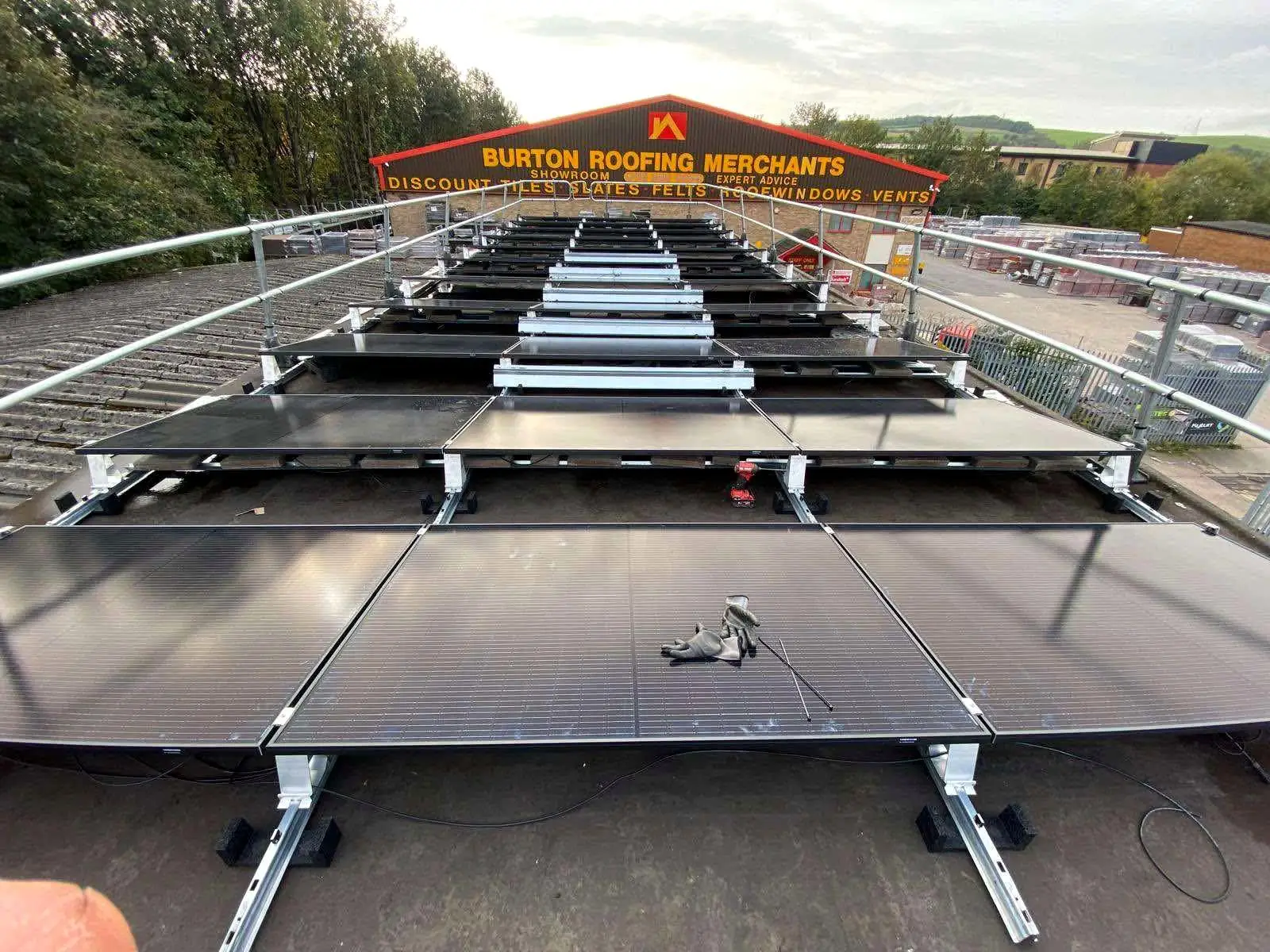 Ballasted solar array being installed on a flat commercial roof
